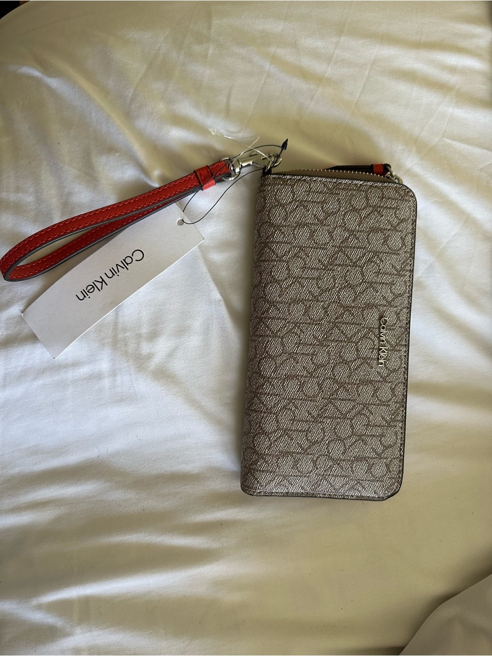 Calvin Klein Tan Monogram Zip Wallet with Orange Wristlet